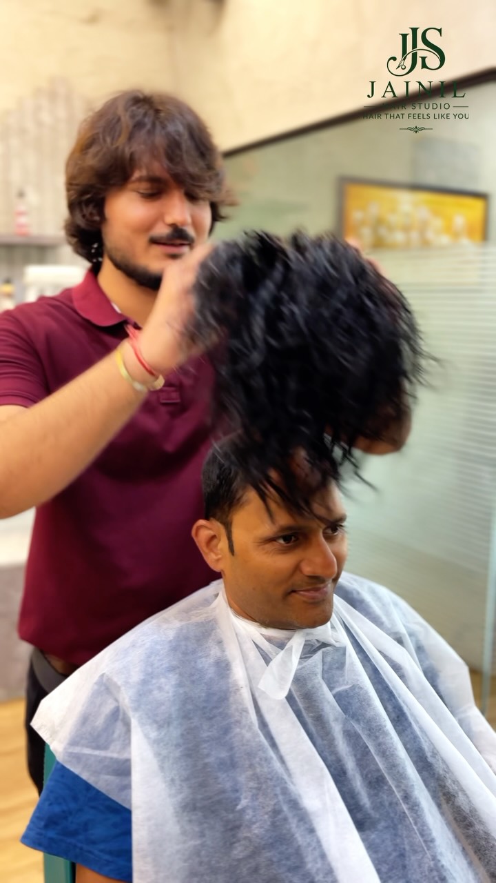 Jainil Hair Studio hair transformation reel cover